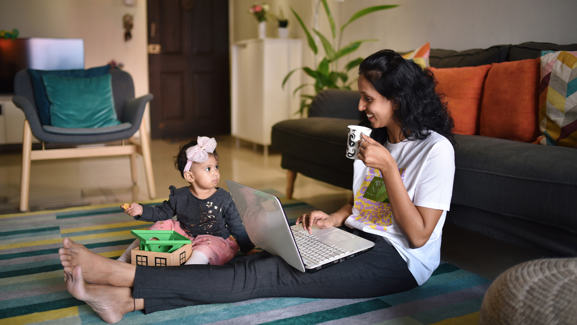 A woman using computer; image used for HSBC India Be aware of scams and fraud article