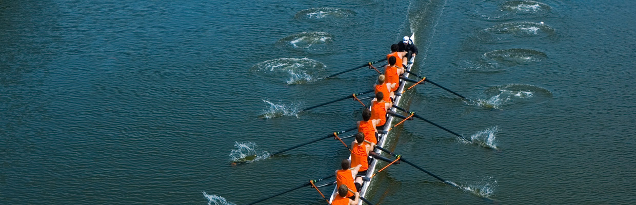 Men rowing in a lake; image used for HSBC Savings Account page.