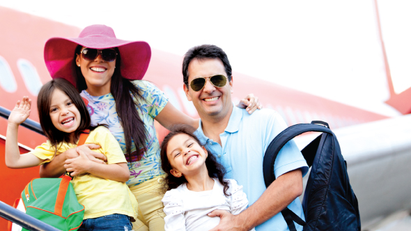 A family laughing; image used for HSBC Goal planning page.