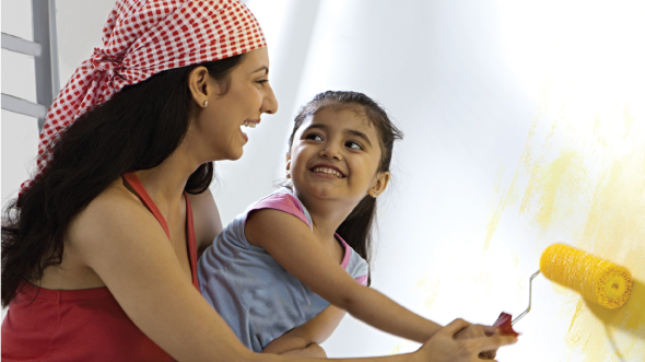 Mother and daughter are painting; image used for HSBC Goal planning page.
