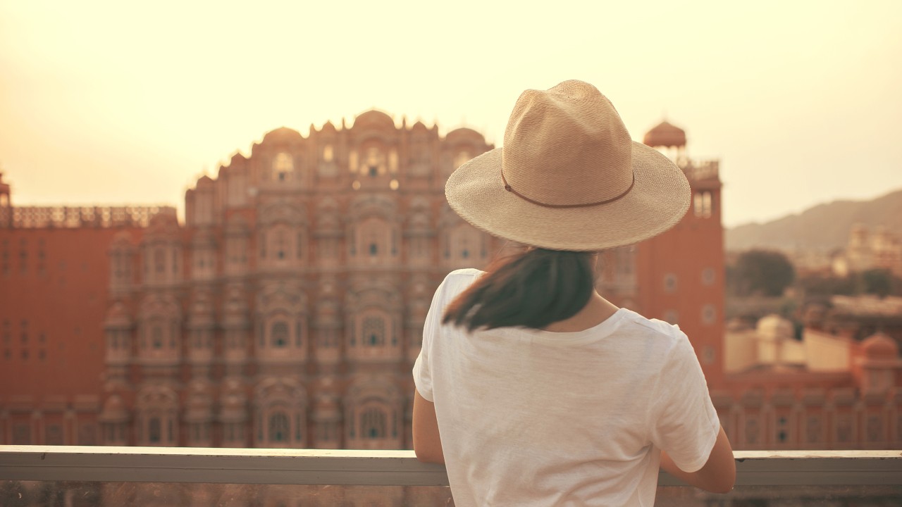 A woman looking at Hawa mahal at Jaipur; imaged used for HSBC moving to India