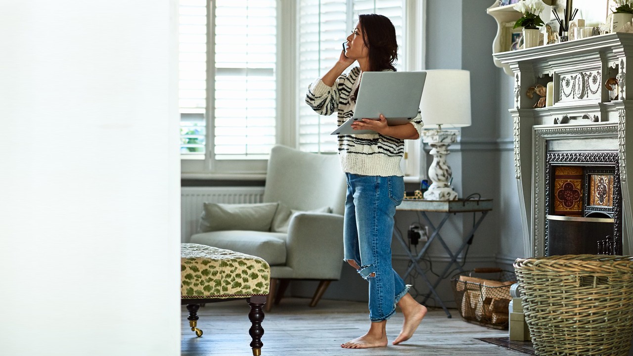 A woman talking on the phone; image used for HSBC India Avoid excessive borrowing article