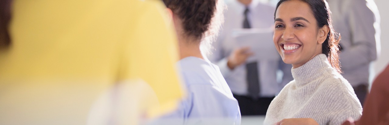 A smiling lady; image used for HSBC breaking down co-op programmes in Canada page.