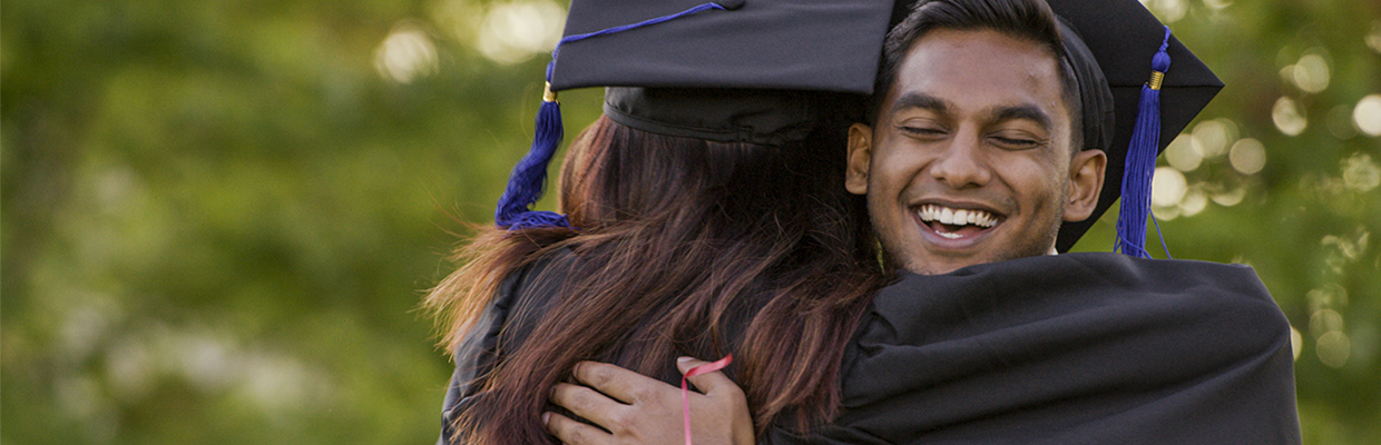 Two graduates are hugging; image used for HSBC India Why should I study in Canada page.