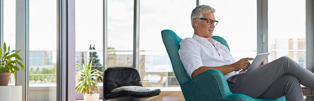 A man enjoying on the armchair; image used for HSBC India Save for the future article