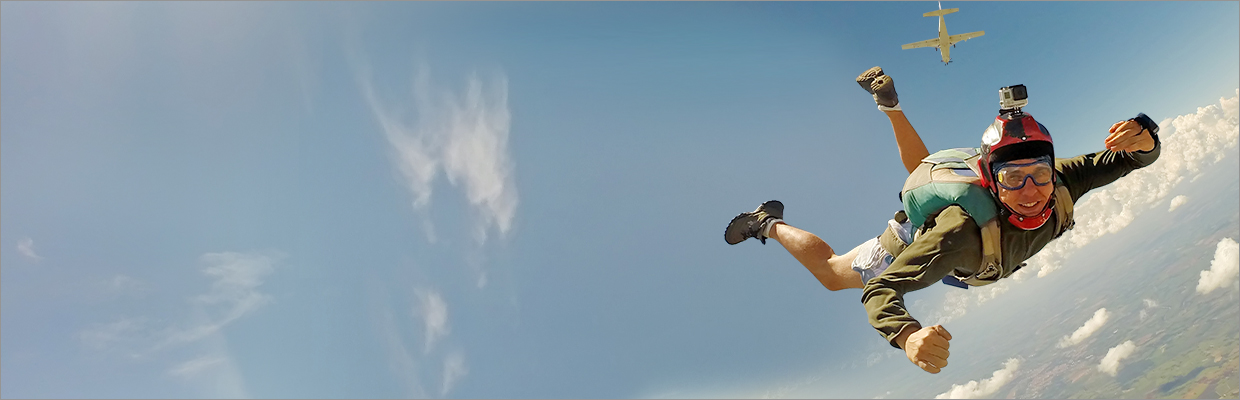 A man is skydiving; image used for HSBC Visa Platinum Credit Card.