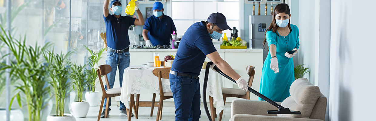 A woman guiding a cleansing service worker at home; image used for HSBC India Urban Company credit card offer page