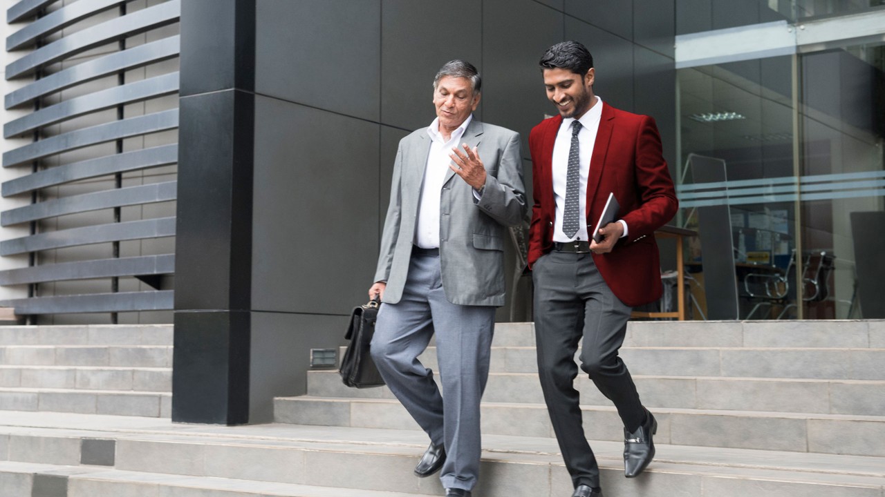 businessmen are leaving offices