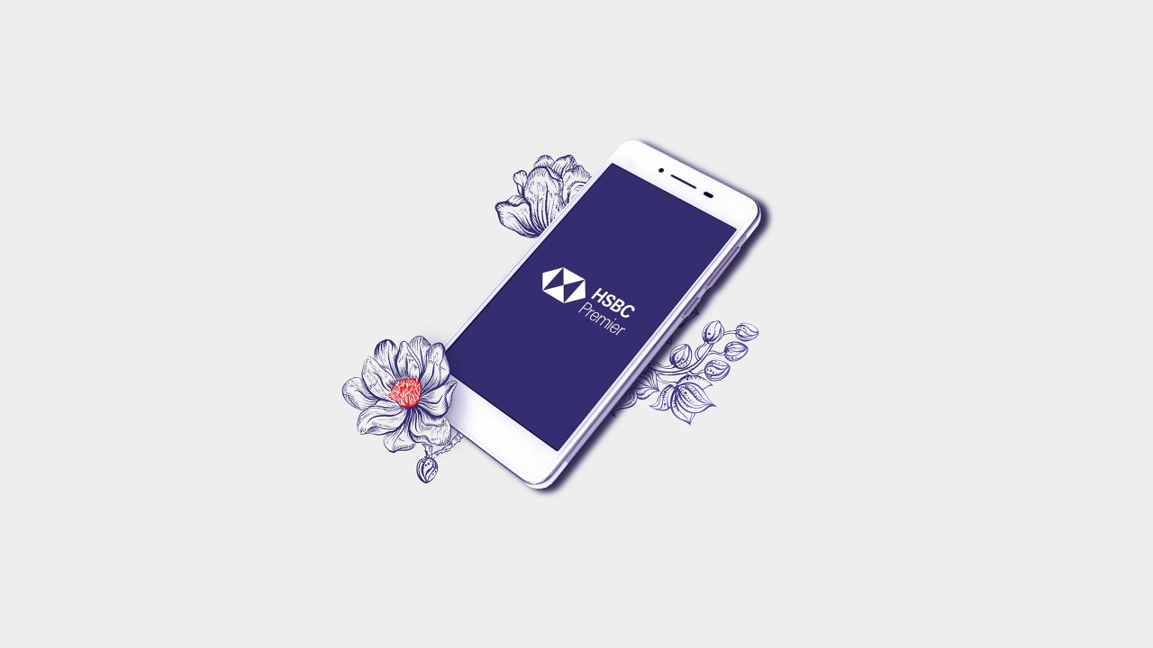 A mobile phone with HSBC logo on the screen; image used for HSBC India online banking