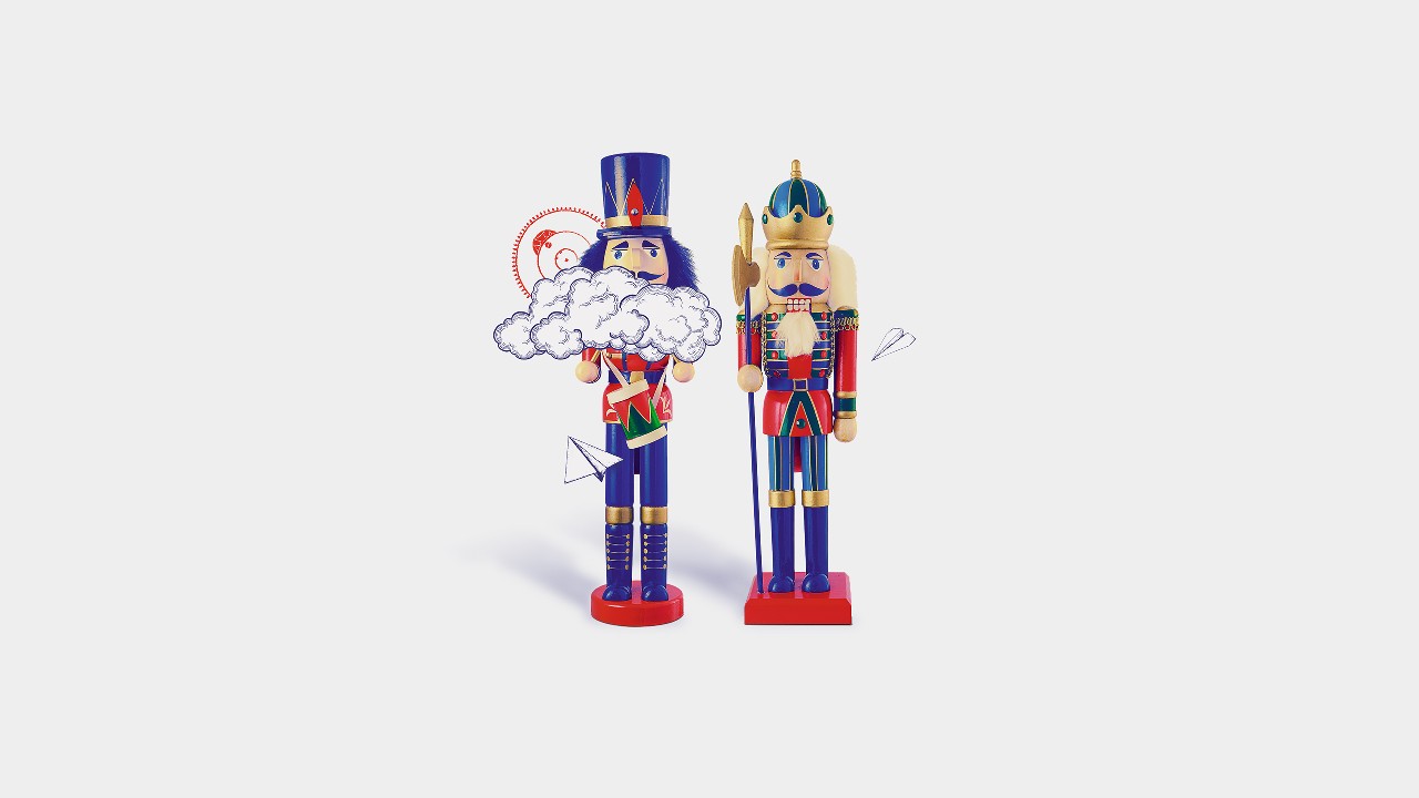 Two wooden toy soldiers; image used for HSBC India Emergency Services & International Travel Insurance page